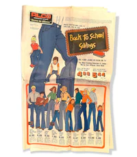 a newspaper advertisement with a picture of a pair of jeans