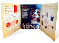 a folded brochure with a dog on it