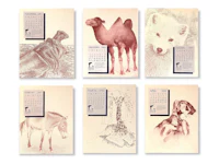 a set of calendars with animals on them