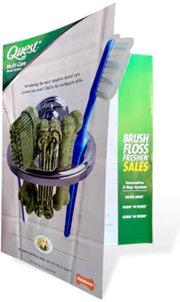 a brochure with toothbrushes and a toothbrush holder