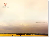 the cover of the annual report of a farm in the middle of a field