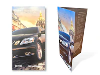 a tri fold brochure with a picture of a car